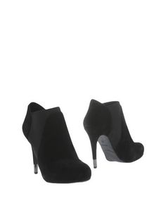 Полусапоги и высокие ботинки Guess