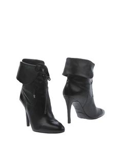 Полусапоги и высокие ботинки Guess