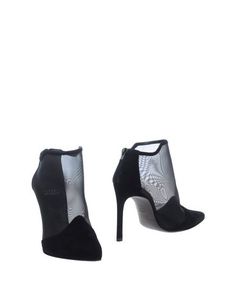 Полусапоги и высокие ботинки Stuart Weitzman