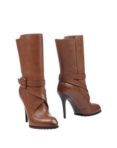Полусапоги и высокие ботинки Tod`S