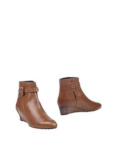 Полусапоги и высокие ботинки Tod`S