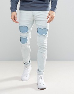 Выбеленные супероблегающие джинсы с рваной отделкой ASOS - Синий