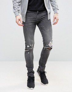 Черные супероблегающие джинсы с рваной отделкой и молниями ASOS - Черный