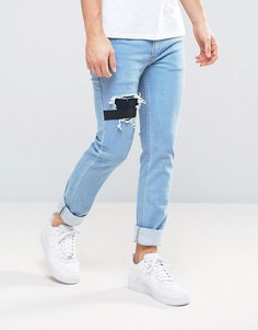 Узкие эластичные джинсы с нашивками и прорехами Religion - Серый