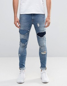 Супероблегающие джинсы с рваной отделкой ASOS - Синий