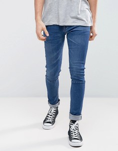 Темно-синие джинсы скинни со вставками ASOS - Синий