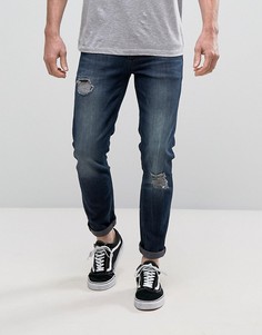Рваные темные джинсы скинни ASOS - Синий