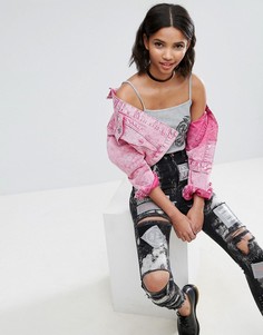 Джинсы скинни с рваной отделкой и нашивками ASOS Rebel - Черный