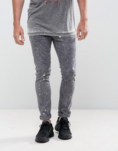 Супероблегающие джинсы из черного мраморного денима ASOS - Черный