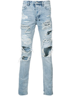 джинсы с рваными деталями Ksubi