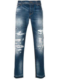 джинсы с протертыми деталями Dolce & Gabbana
