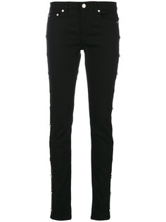 узкие джинсы с заклепками в виде звезд Givenchy
