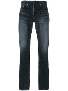 узкие джинсы с протертостями Saint Laurent