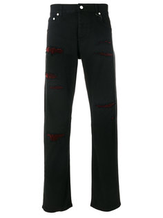 джинсы с потертой отделкой Alexander McQueen