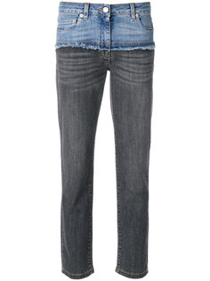 deconstructed cropped jeans Moschino