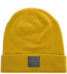 Желтая шапка с логотипом бренда The North Face