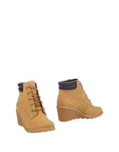 Полусапоги и высокие ботинки Timberland