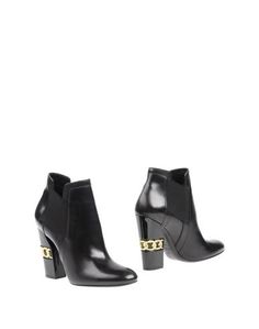 Полусапоги и высокие ботинки Casadei