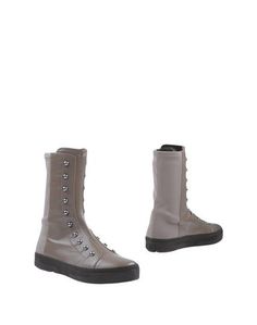 Полусапоги и высокие ботинки Stuart Weitzman