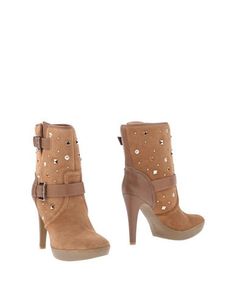 Полусапоги и высокие ботинки Guess