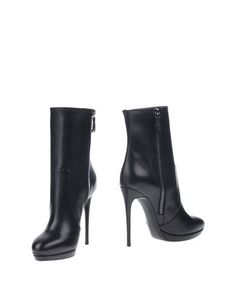 Полусапоги и высокие ботинки Casadei
