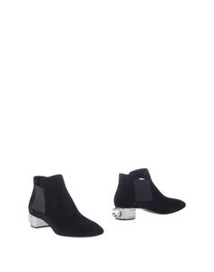 Полусапоги и высокие ботинки Casadei