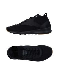 Низкие кеды и кроссовки Reebok