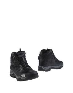 Полусапоги и высокие ботинки The North Face