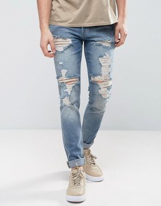 Синие выбеленные зауженные джинсы в винтажном стиле с рваной отделкой ASOS - Синий