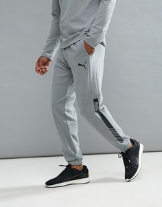 Серые флисовые брюки для бега Puma Future Tech 59247803 - Серый