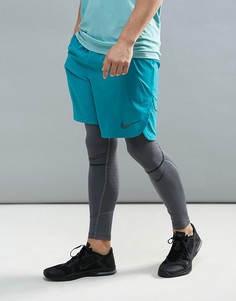 Синие спортивные шорты из материала Flex Nike 833374-467 - Синий