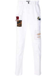 брюки с заплатками Dsquared2