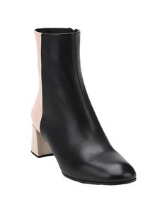 Полусапоги и высокие ботинки Jil Sander
