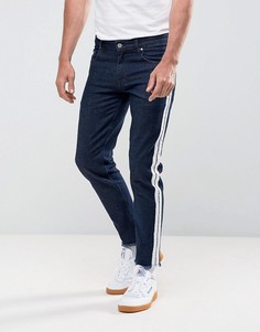 Узкие эластичные джинсы цвета индиго с полосками в стиле ретро ASOS - Синий