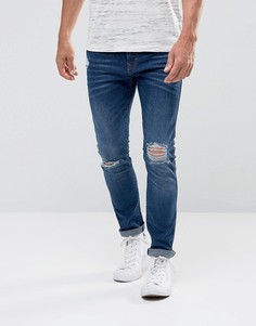 Эластичные зауженные джинсы c рваной отделкой Esprit - Синий