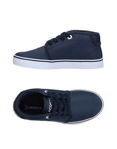 Низкие кеды и кроссовки Lacoste