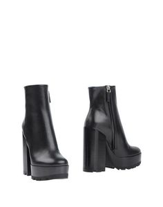 Полусапоги и высокие ботинки Jil Sander