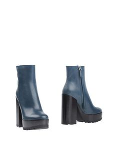 Полусапоги и высокие ботинки Jil Sander