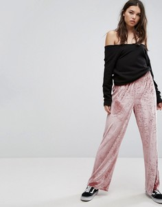 Бархатные широкие брюки ASOS - Розовый