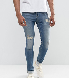Синие джинсы скинни с рваной отделкой ASOS TALL - Синий