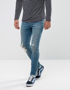 Синие джинсы скинни с рваной отделкой ASOS - Синий