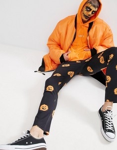 Брюки скинни с принтом тыквы ASOS Halloween - Черный