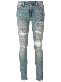 джинсы с рваными деталями Amiri