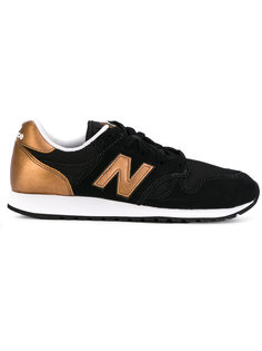 кроссовки с панелями металлик New Balance
