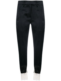 брюки с кружевными вставками на манжетах Ann Demeulemeester
