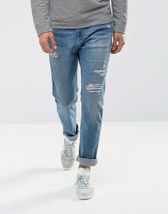 Зауженные джинсы с рваной отделкой Hollister - Синий