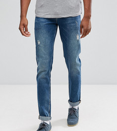 Темные узкие эластичные джинсы с потертостями ASOS TALL - Синий