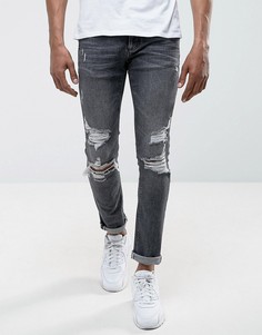 Черные джинсы скинни с рваной отделкой River Island - Черный