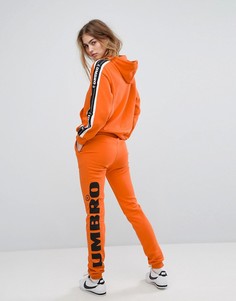 Спортивные брюки с логотипом на штанине Umbro - Оранжевый