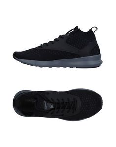 Низкие кеды и кроссовки Reebok